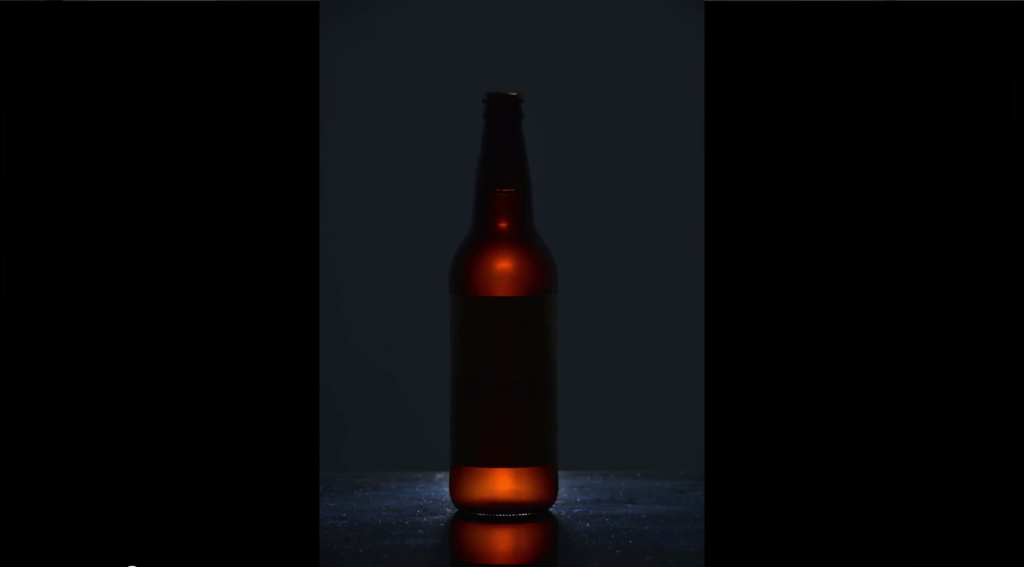 One light behind the bottle